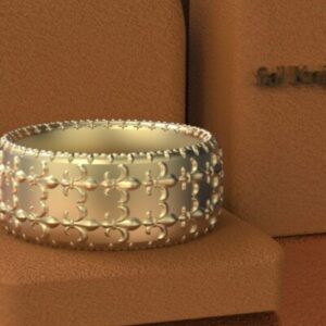 A silver ring sitting on top of boxes.